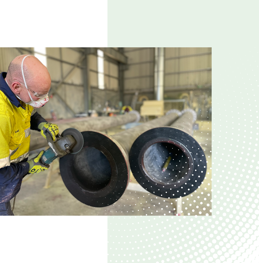 Man applying rubber lining treatment